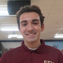 Photo of Vincent Ciullo - Male smiling wearing a garnet FSU polo shirt with FSU logo