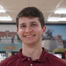 Photo of Jared Fantle - Male smiling wearing a garnet FSU polo shirt with FSU logo