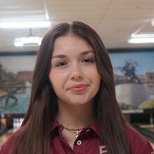 Photo of Savanna Rodriguez - Female smiling wearing a garnet FSU polo shirt with FSU logo